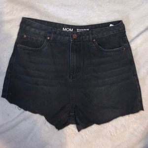Black cutoff mom shorts